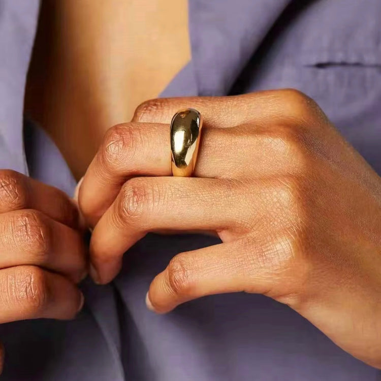 The Remi Ring boasts a unique arc shape, making it a bold statement piece for any outfit. Crafted with expert precision, this ring offers a sleek and modern design for those seeking a sophisticated accessory.
Stainless Steel 18K Gold PVD Plated - Made to last!
Hypoallergenic, Tarnish free Beach & Pool Friendly