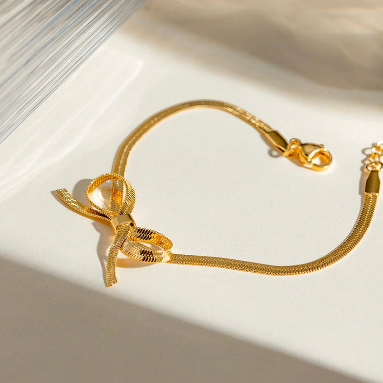 Bow Snake Link Bracelet XMTX Collections