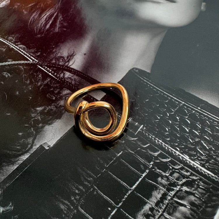 Cassie ring flat lay gold modern ring