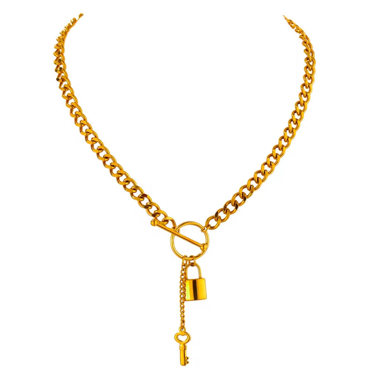 Add a touch of edge to your look with our Lock & Key Chain Necklace. The thick cuban link design is both bold and stylish, while the unique lock and key feature adds a touch of romance. A must-have statement piece for any fashionista.
Made to last!
Tarnish and Water Resistant, Hypoallergenic
18 inches long
18k Gold PVD Plated over 316L Stainless Steel base.
