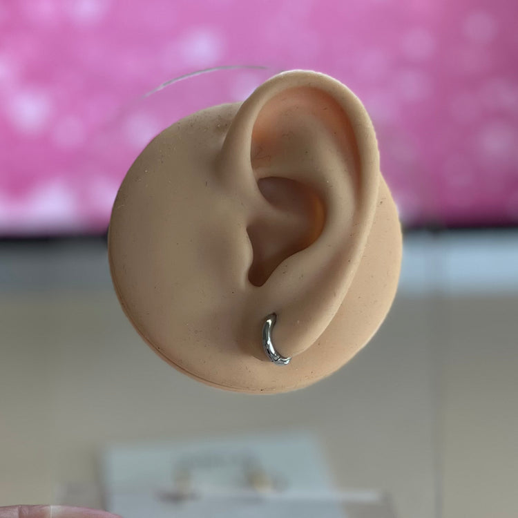 Upgrade your earring game with our Tiny Hoops Earrings. Their perfect size allows you to stack them up for multiple piercings or wear them as a single huggie, adding effortless style to any look.
Made to last! Non Tarnish and Water Resistant, Hypoallergenic
10 mm diameter
14 mm diameter
18K Gold Plated over 316L Stainless Steel base