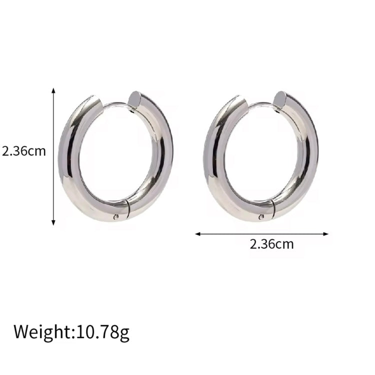 Indulge in the timeless elegance of our Celine Silver Hoop Earrings. Classic and must-have, these earrings are the perfect addition to any outfit. Elevate your style and make a statement with these exquisite hoops. You won&