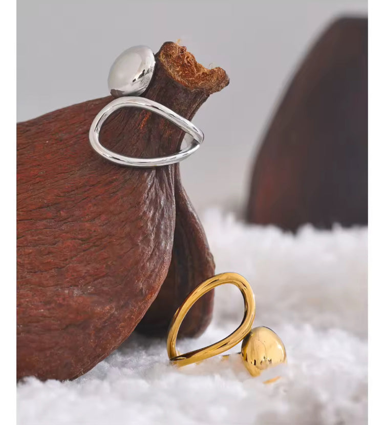 Experience the art of modern luxury with our Galiya Open Ring. The abstract open design creates a sophisticated and exclusive statement piece, sure to start conversations. Elevate your style and be the center of attention with this uniquely elegant ring.
Fits SIZE - 6/7/8 Adjustable
Stainless Steel 18K Gold PVD Plated - Made to last!
Hypoallergenic, Tarnish free