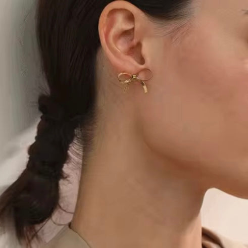 Bow Snake Link Earrings XMTX Collections