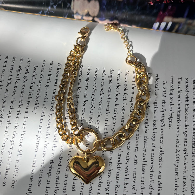 This Heart Charm Bracelet exudes elegance with a modern, chic design. The delicate cuban and oval link chains are connected by a heart charm, making it a symbol of love and fashion. Wear this stunning bracelet as a reminder of your style and passion.
316L Stainless Steel
6.5 inches long+ 2 " extension
Non Tarnish, Hypoallergenic and water resistant.