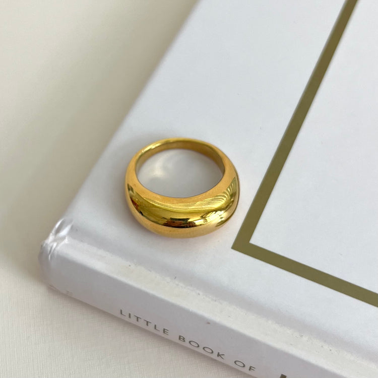 The Remi Ring boasts a unique arc shape, making it a bold statement piece for any outfit. Crafted with expert precision, this ring offers a sleek and modern design for those seeking a sophisticated accessory.
Stainless Steel 18K Gold PVD Plated - Made to last!
Hypoallergenic, Tarnish free Beach & Pool Friendly