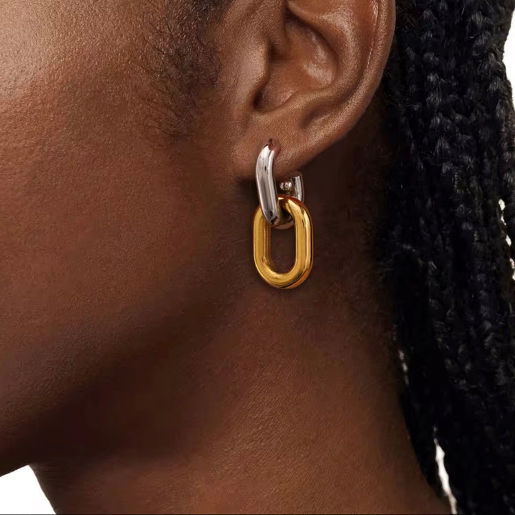 Introducing Erina Two Tone Chain Hoop Earrings - a must-have for any collection. These elegant earrings feature a trendy two-tone design and are sure to elevate any outfit. A staple for every fashion-forward individual.
Made to last! Tarnish and Water Resistant, Beach & Shower friendly, Hypoallergenic
18K Gold Plated over 316L Stainless Steel base