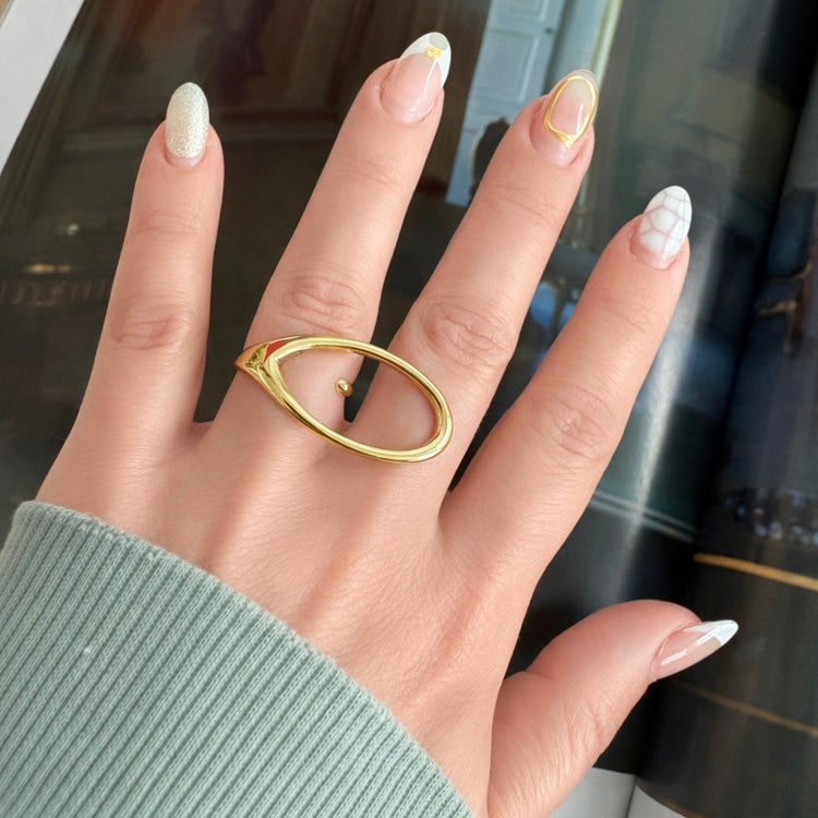 Liv Ring gold open wrap adjustable statement ring on hand