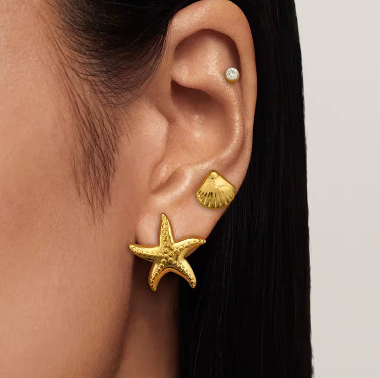 Complement your summer style with these charming Starfish Stud Earrings. Perfect for everyday wear or your next beach vacation, these earrings will add a touch of whimsy and ocean vibes to any outfit. Embrace the carefree spirit of summer with these must-have accessories!
1" long x 1" wide
18K Gold Plated over 316L Stainless
Hypoallergenic, Water Resistant, Beach, Shower, Gym friendly. Made to last.