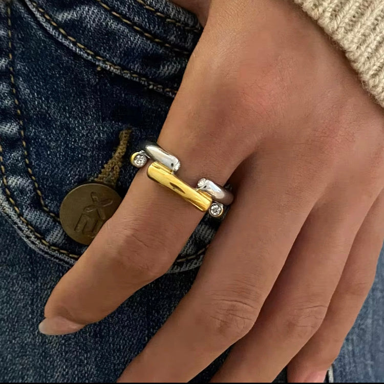 The Angelika Open Band Ring is a stunning embodiment of modern elegance and sophistication. With a seamless blend of gold and silver tones, this ring exudes luxury and versatility. Made with a durable and comfortable design, it is the perfect statement piece for any occasion.
Metal: Stainless Steel
Hypoallergenic AND; Water Resistant
Size: 7 only