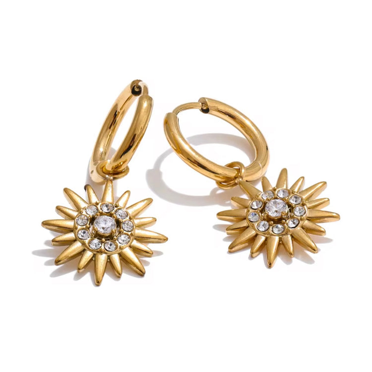Experience endless summer vibes with Sun Huggies Earrings. These earrings keep the feeling of summer alive forever, making them the perfect accessory for any sun lover. Stay stylish and always feel the warmth of the sun with these trendy earrings.
Made to last! Non Tarnish and Water Resistant, Hypoallergenic
18K Gold Plated over 316L Stainless Steel base
