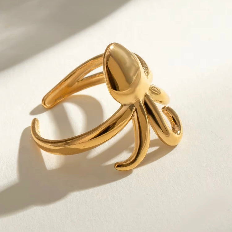 Experience beach life all year round with our Octopus Open Ring. This charming accessory is perfect for those who love forever summer vibes. Its cute design will add a touch of whimsy to any outfit. Get your hands on this must-have piece now.
Metal: 18K Gold over Stainless Steel
Size: Adjustable fits size 7/8