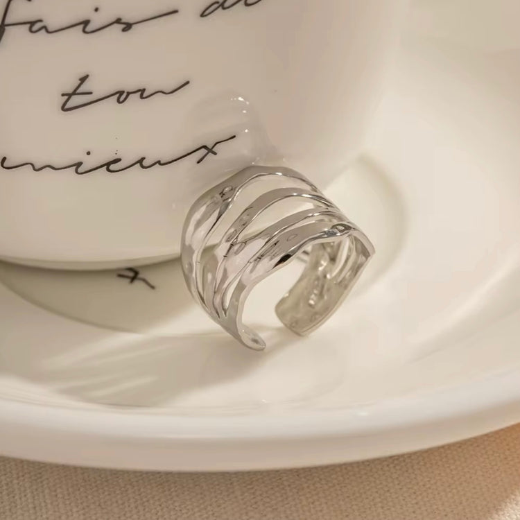 Experience timeless elegance with our Four Layers Ring. Crafted with precision and beauty in mind, this ring is sure to make a statement. The unique four layers design adds a modern touch to its classic beauty. Perfect for any occasion, this ring is a must-have for any jewelry collection.
Metal: Stainless Steel
Water resistant, Beach Friendly
Size: Adjustable fits size 7/8