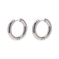 Indulge in the timeless elegance of our Celine Silver Hoop Earrings. Classic and must-have, these earrings are the perfect addition to any outfit. Elevate your style and make a statement with these exquisite hoops. You won&