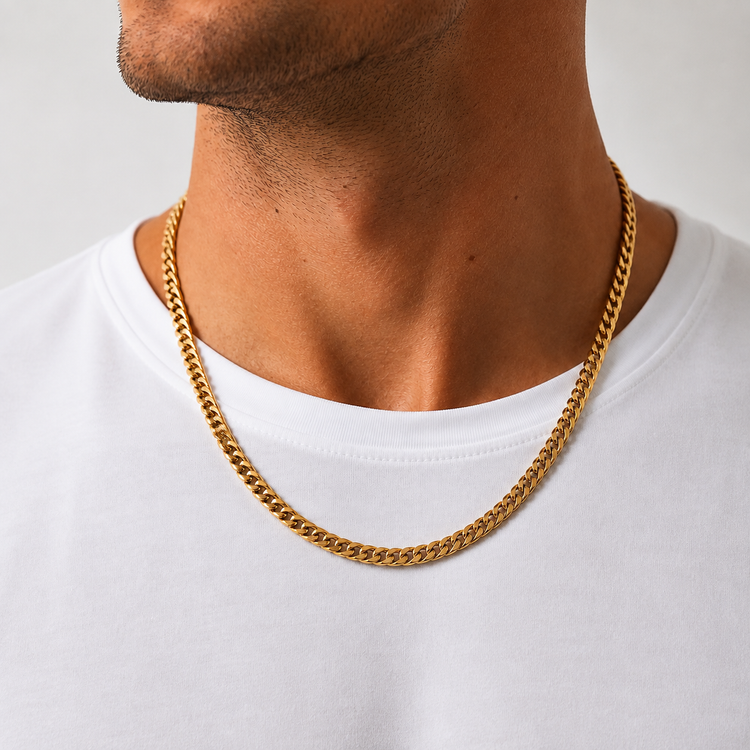 Model wearing an 8mm gold Cuban chain necklace