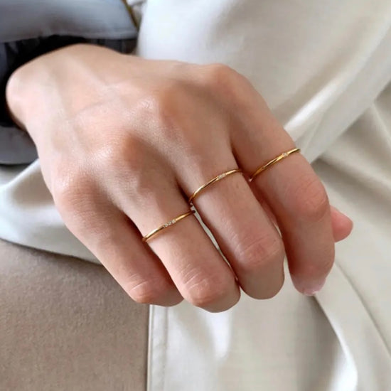 If you like dainty rings, this ring is calling your name. Super girly and stackable with any ring you already have. &nbsp;Picture shows 3 rings on, sold as 1 ring&nbsp;


Stainless Steel, 18K gold plated&nbsp;

Crystal Rhinestone&nbsp;

Hypoallergenic Tarnish Free&nbsp;