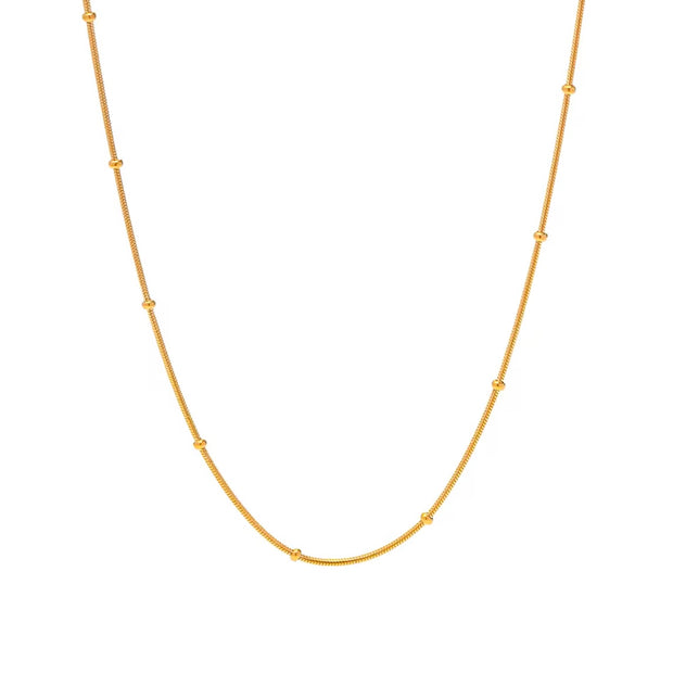 This delicate necklace is perfect for adding a touch of girly charm to any outfit. The thin bead chain adds a dainty and feminine look, making it an ideal accessory for any fashion-forward individual. A must-have for any jewelry collection!

Made to last! 

Tarnish and Water Resistant, Hypoallergenic

16.5 inches long- 2" Extension 

 

Closure :Lobster Clasp

18k Gold Plated over 316L Stainless Steel base.  

 

 