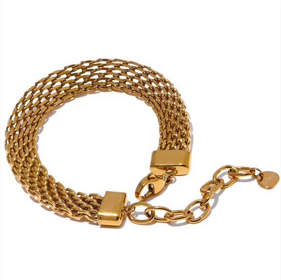 Introducing the Bria Woven Bracelet - a beautiful and elegant accessory that will add a touch of sophistication to any outfit. Its simple design exudes timeless charm and can be effortlessly dressed up or down. Elevate your style with this must-have bracelet.



316L Stainless Steel 18K PVD Gold Plated

7 inches long +2" inches ext