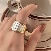 Upgrade your look with the Kelly Mother of Pearl Ring. This elegant piece features durable, non-tarnish materials, making it perfect for beach outings or any occasion. Its unique design is sure to spark conversation.

Stainless Steel 18K Gold Plated - Made to last!

Non Tarnish, Water Resistant , Hypoallergenic, Friendly 

 