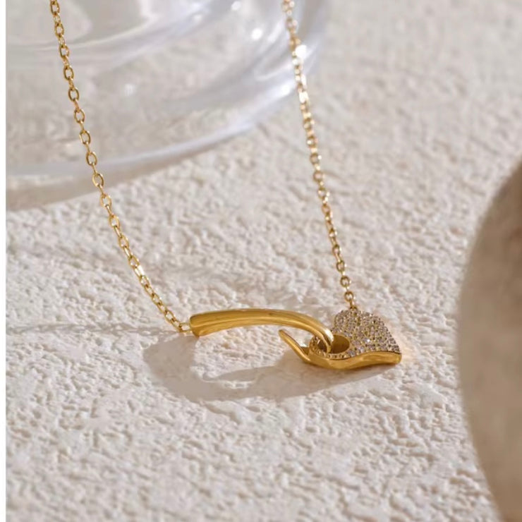 This exquisite Valencia Pave Heart Necklace features a dainty and beautifully designed pave crusted heart. Add a touch of elegance to any outfit with this stunning piece.

Made to last! 

Tarnish and Water Resistant, Hypoallergenic



16 inches long + 2 inches ext 

Closure :Lobster Clasp



18k Gold PVD Plated over 316L Stainless Steel base.  



