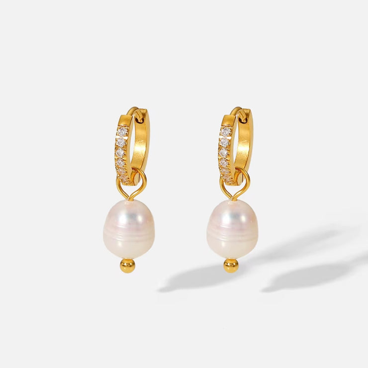 Hope you love or Allegra earring as much as we do. 
These classy babies will complete any outfit!

Made to last! 

Tarnish and Water Resistant. & Hypoallergenic

Latch hoop .5 inch x .5 inch 

18k Gold Plated over Stainless Steel  base.  

Fresh Water Pearl 

 

 .

 

 