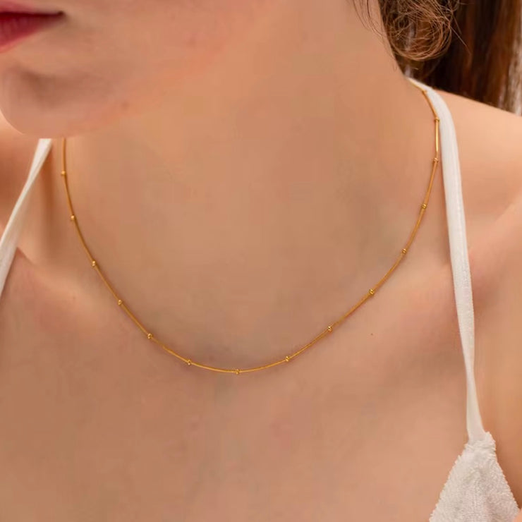 This delicate necklace is perfect for adding a touch of girly charm to any outfit. The thin bead chain adds a dainty and feminine look, making it an ideal accessory for any fashion-forward individual. A must-have for any jewelry collection!

Made to last! 

Tarnish and Water Resistant, Hypoallergenic

16.5 inches long- 2" Extension 

 

Closure :Lobster Clasp

18k Gold Plated over 316L Stainless Steel base.  

 

 