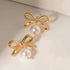 Bow Pearl Earrings XMTX Collections