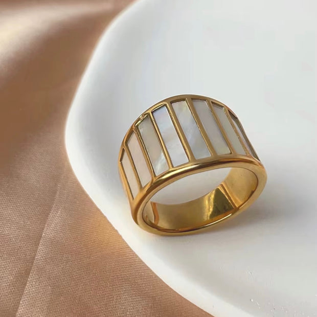 Upgrade your look with the Kelly Mother of Pearl Ring. This elegant piece features durable, non-tarnish materials, making it perfect for beach outings or any occasion. Its unique design is sure to spark conversation.

Stainless Steel 18K Gold Plated - Made to last!

Non Tarnish, Water Resistant , Hypoallergenic, Friendly 

 