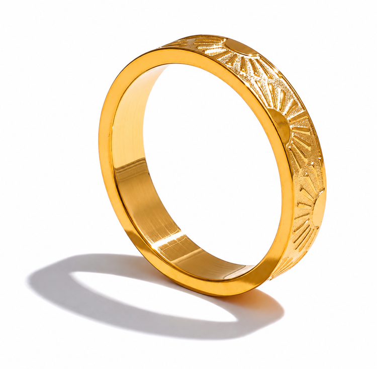 Sun Ring waterproof non-tarnish engraved gold band on a white background