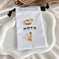 Leona gold double hoop earrings with XMTX