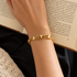 nedda-gold-bracelet-on-wrist
