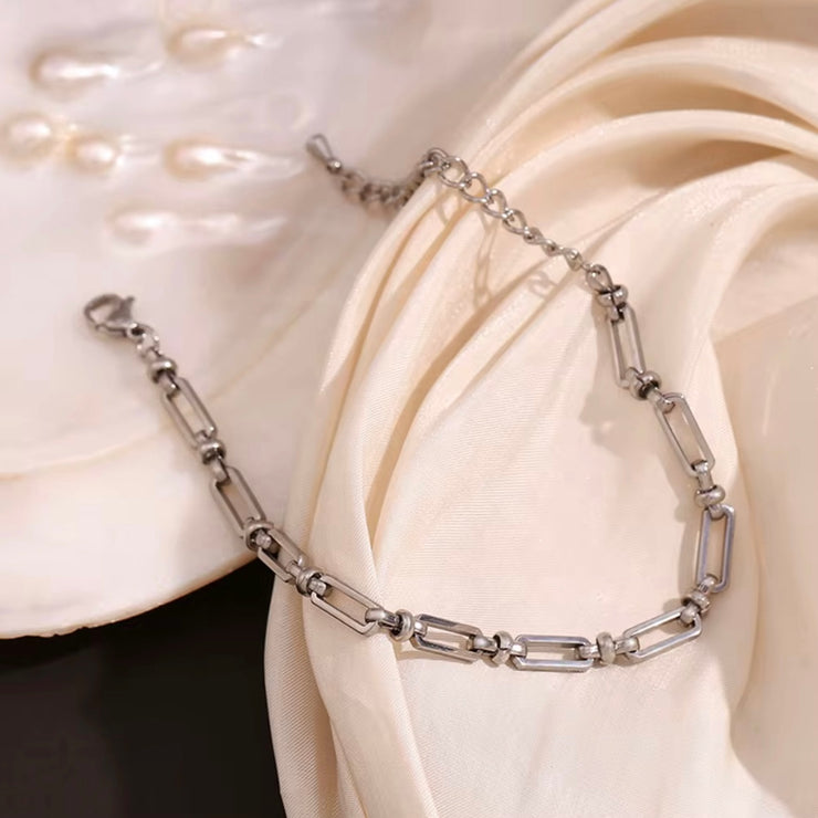 Introducing the Zala Rectangle Link Bracelet - the perfect addition to any jewelry collection. Its dainty design adds a touch of elegance, and when stacked, it creates a stunning statement piece. Crafted with precision, this bracelet is both pretty and versatile.&nbsp;

316L Stainless Steel&nbsp;

6.5 inches long+ 2 " extension

Non Tarnish, Hypoallergenic and water resistant.