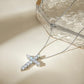 Embrace timeless beauty with our Statement Rhinestone Cross Necklace. Each sparkling stone exudes elegance, making a bold statement that is sure to elevate any outfit. Perfect for any occasion, this necklace is a must-have in your jewelry collection. Shine on with this beautiful, timeless piece.

Made to last!&nbsp;Tarnish and Water Resistant, Hypoallergenic

20" long +2" ext

Closure : Lobster Clasp

Cross 1.3"

316L Stainless Steel&nbsp;


