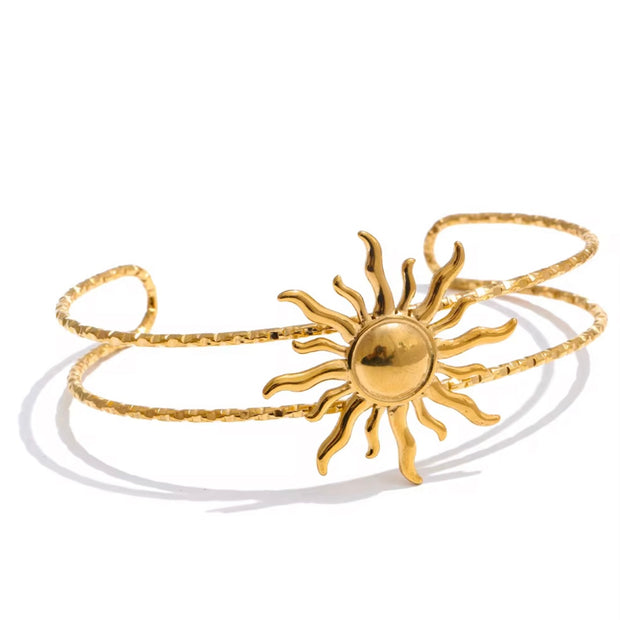 Add some ocean sunset vibes to your summer look with our Beach Bum Bangle Bracelet. Made to last, this must-have accessory will make you the it girl at the beach or pool. Don't miss out on this trendy essential.

&nbsp;

This piece is made to last, hypoallergenic &nbsp;&amp; waterproof , adjustable

316L Stainless Steel 18K Gold Plated

Max fit 7 inches