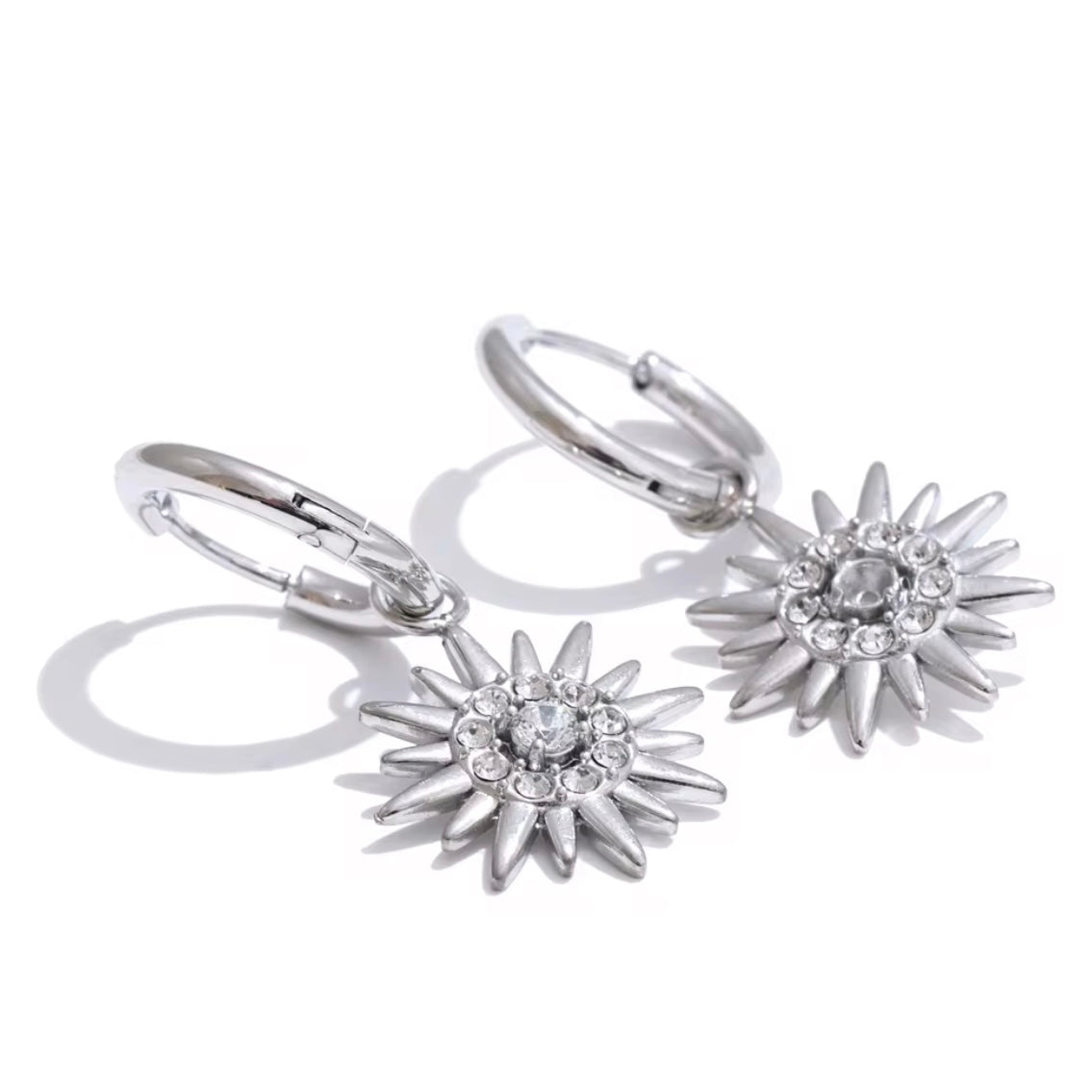Experience endless summer vibes with Sun Huggies Earrings. These earrings keep the feeling of summer alive forever, making them the perfect accessory for any sun lover. Stay stylish and always feel the warmth of the sun with these trendy earrings.

Made to last! Non Tarnish and Water Resistant, Hypoallergenic




18K Gold Plated over 316L Stainless Steel base


