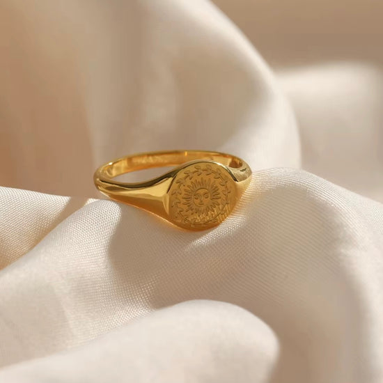 The Sun Goddess Ring features a stunning etched sun design, symbolizing life, energy, and positivity. This motif represents new beginnings, inner strength, and a connection to the divine. Elevate your style and embrace powerful energy with this beautiful ring.

Stainless Steel 18K Gold PVD Plated - Made to last!

Hypoallergenic, Tarnish free&nbsp;