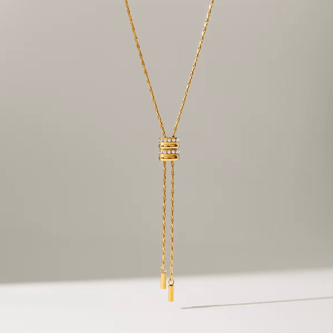 Close-up of Alana Slider Long Necklace crystal slider detail