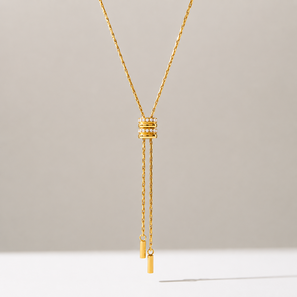 Front view of the Alana Slider Long Necklace with adjustable pavé slider in gold.