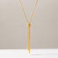Front view of the Alana Slider Long Necklace with adjustable pavé slider in gold.