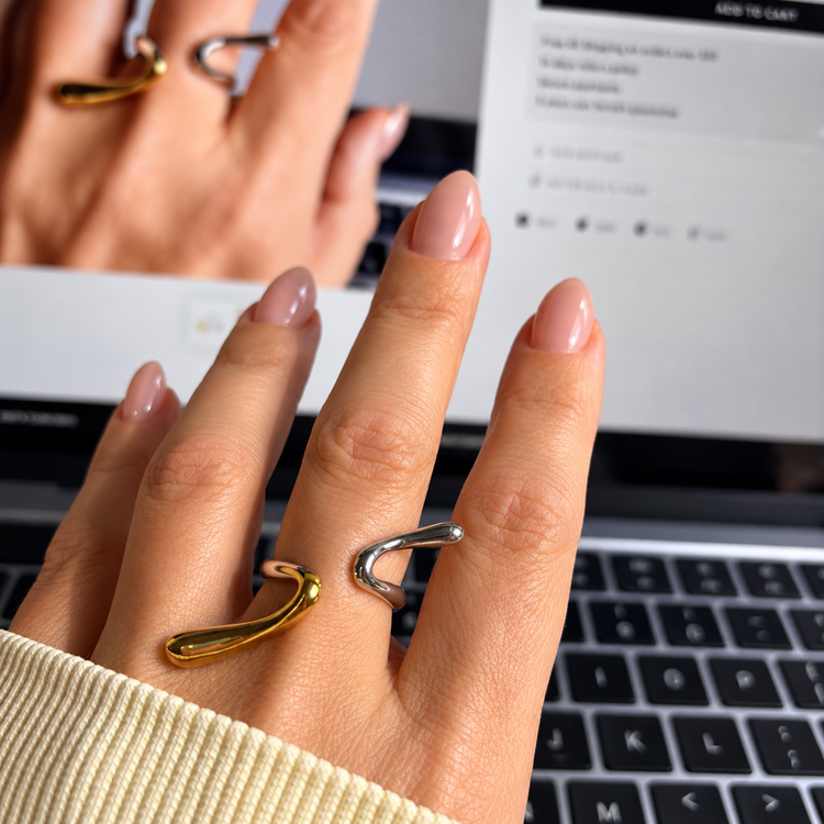 Anya two tone geometric statement ring worn with other rings