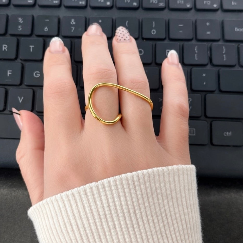 Billy Geometric Double Ring in gold worn on hand over keyboard – waterproof geometric statement ring