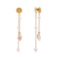 	Gold spiral earrings with freshwater pearls and conch shell charm