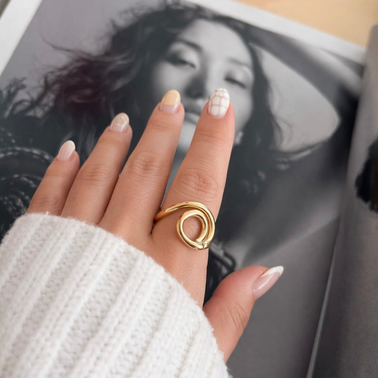 Cassie gold swirl ring on hand modern statement ring