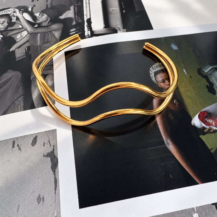 Cindy non-tarnish gold bangle bracelet flatlay