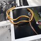 Cindy non-tarnish gold bangle bracelet flatlay