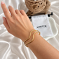 Cindy waterproof gold wave bracelet worn on wrist