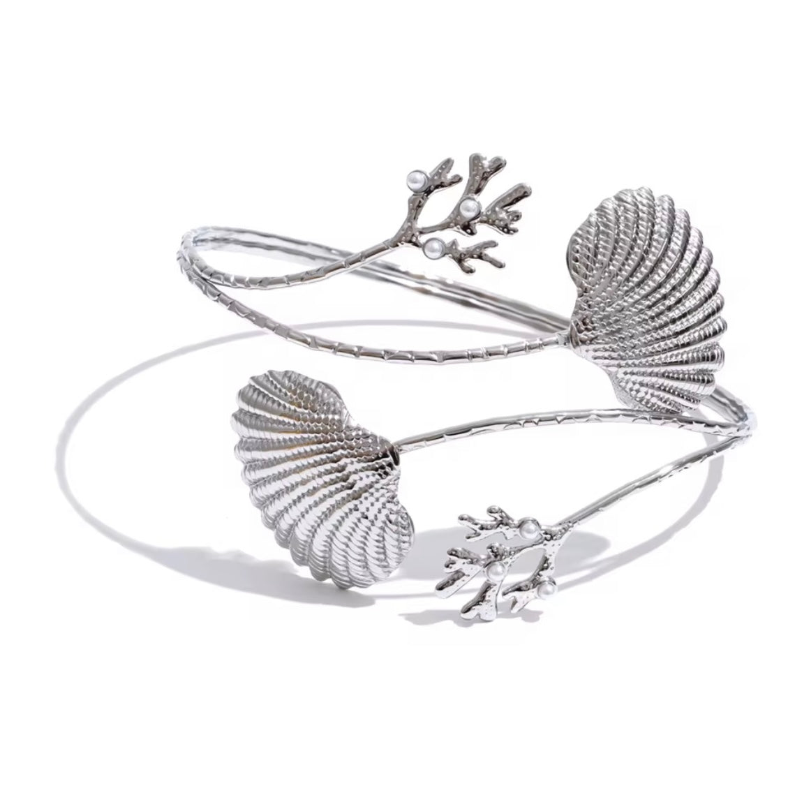 Silver Corals & Shells Upper Arm Cuff Bracelet in polished stainless steel with coral and shell design on a white background