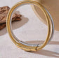 Introducing the Ava Cord Bangle Bracelet - a sleek and modern accessory that effortlessly adds a chic touch to any outfit. Made with a flexible cord design, this bracelet is both stylish and comfortable to wear. Elevate your look with this versatile and sophisticated piece.

 

This piece is made to last, hypoallergenic  & waterproof.

316L Stainless Steel 18K Gold Plated

Max fit 7inches / Link 5mm wide