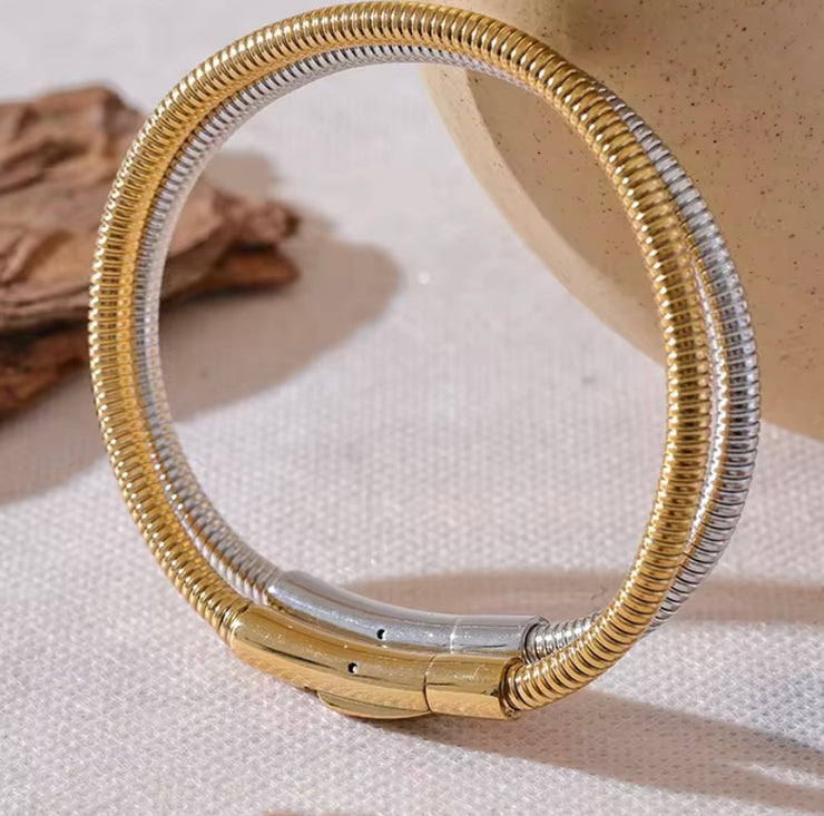 Introducing the Ava Cord Bangle Bracelet - a sleek and modern accessory that effortlessly adds a chic touch to any outfit. Made with a flexible cord design, this bracelet is both stylish and comfortable to wear. Elevate your look with this versatile and sophisticated piece.

 

This piece is made to last, hypoallergenic  & waterproof.

316L Stainless Steel 18K Gold Plated

Max fit 7inches / Link 5mm wide