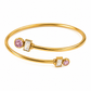 Delia gold bangle bracelet with pink and clear crystal accents